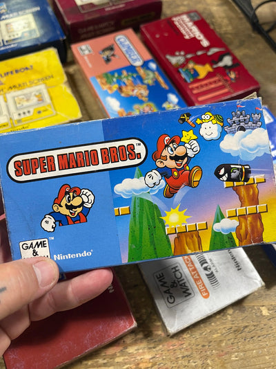 Thriftmarket Game Watch Super Mario Bros nintendo Thriftmarket